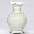 A carved Qingbai 'daylily' vase, Northern Song dynasty (960-1127)