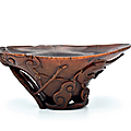A rare Chinese rhinoceros horn ‘chilong and lingzhi’ libation, cup, Qing dynasty, Kangxi period (1662–1722)