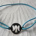 Bracelet pastille Ange sur fil élastique turquoise